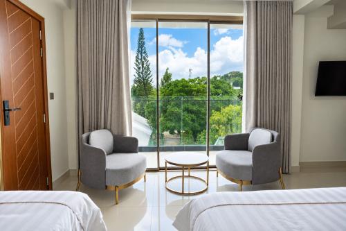 Sitting area by the window in the Deluxe Family Room