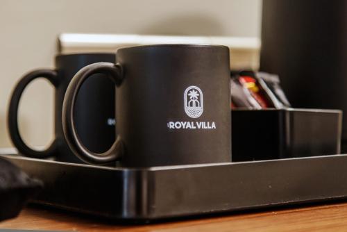 Royal Villa mugs on the in-room tea and coffee tray