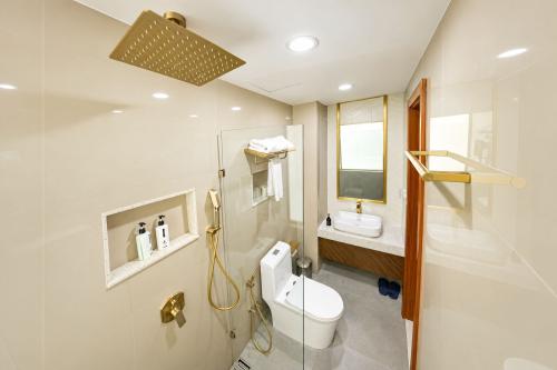 Private bathroom with rain shower at Royal Villa Fulidhoo
